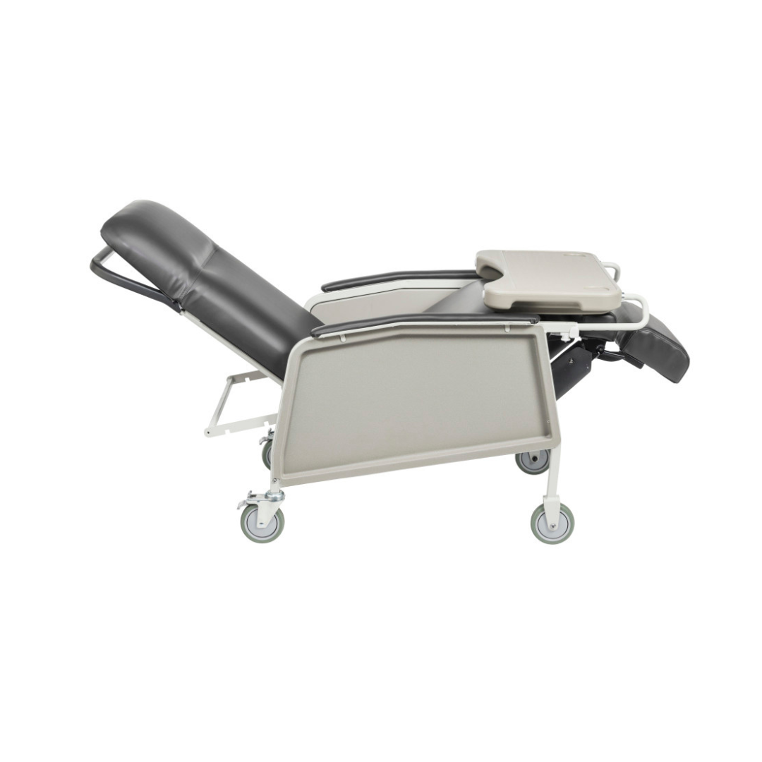 Side view of the Drive 3-Position Geri-Chair Recliner with Wheels in black, featuring an adjustable backrest and a foldable tray on one armrest, designed for patient comfort and mobility.