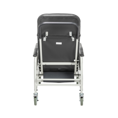 A rear view of the Drive 3-Position Geri-Chair Recliner with Wheels, featuring a black and metal frame, padded armrests, and rubber wheels, displayed against a white background.