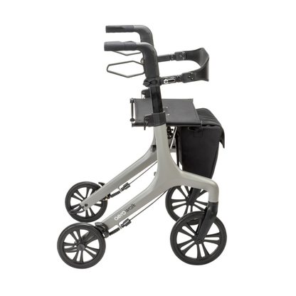 The Drive AeroWalk Ultra-Lite Rollator is shown in a side profile view, featuring four large black wheels, ergonomic handles, a black seat, and an attached storage bag.
