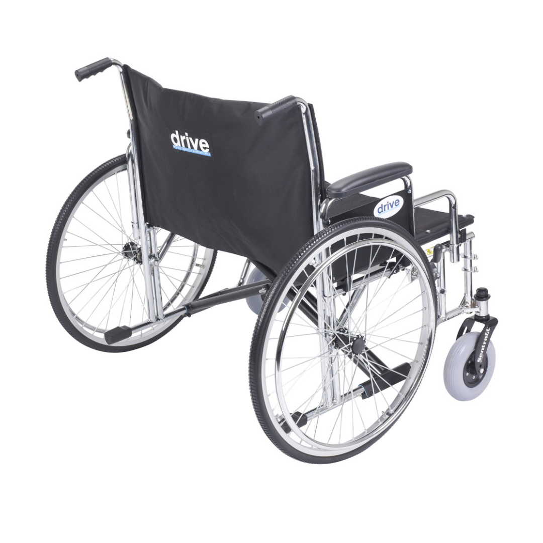 The Drive Bariatric Sentra EC Heavy-Duty Extra-Wide Wheelchair is shown from the rear, with large rear wheels, small front wheels, a black seat, and Drive branding on the fabric and frame against a white background.