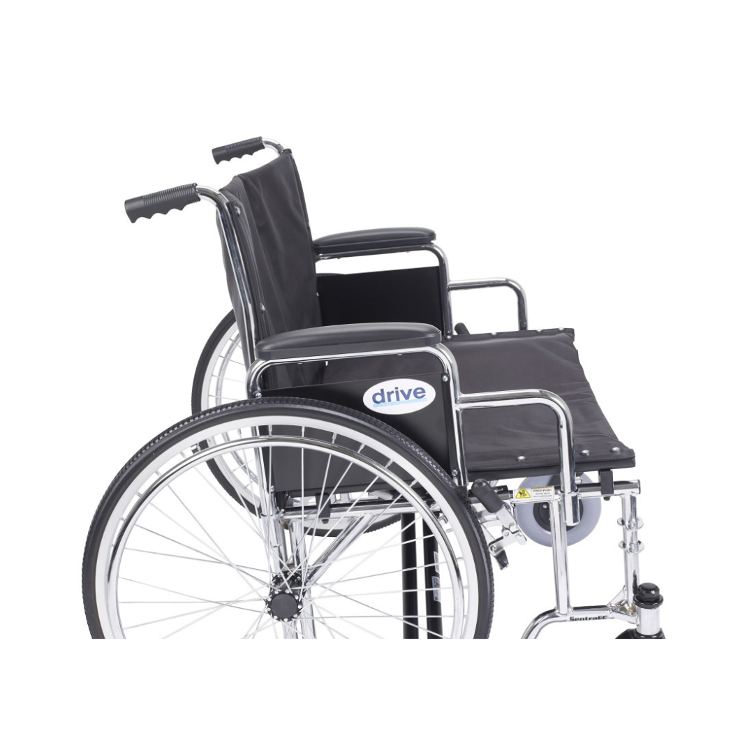 A side view of the Drive Bariatric Sentra EC Heavy-Duty Extra-Wide Wheelchair, black with a chrome frame, armrests, and large rear wheels, featuring the brand name "drive" on the side.