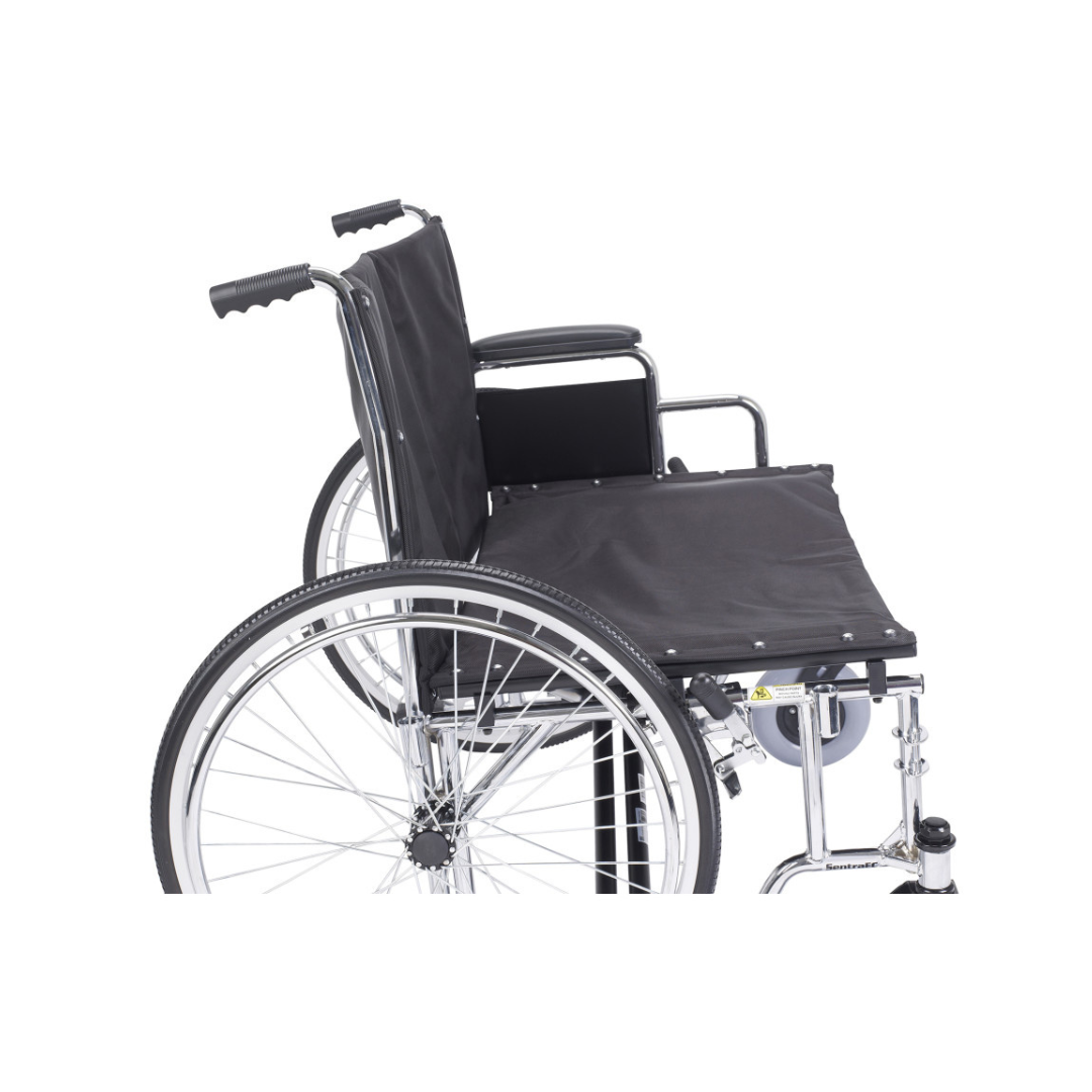 A side view of the Drive Bariatric Sentra EC Heavy-Duty Extra-Wide Wheelchair in black, featuring large rear wheels, a sturdy metal frame, armrests, and footrests, isolated on a white background.