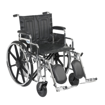 The Drive Bariatric Sentra Extra-Heavy-Duty Wheelchair, shown in black and silver with large rear wheels, armrests, two footrests, and small front wheels, is designed for maximum durability and support on a white background.