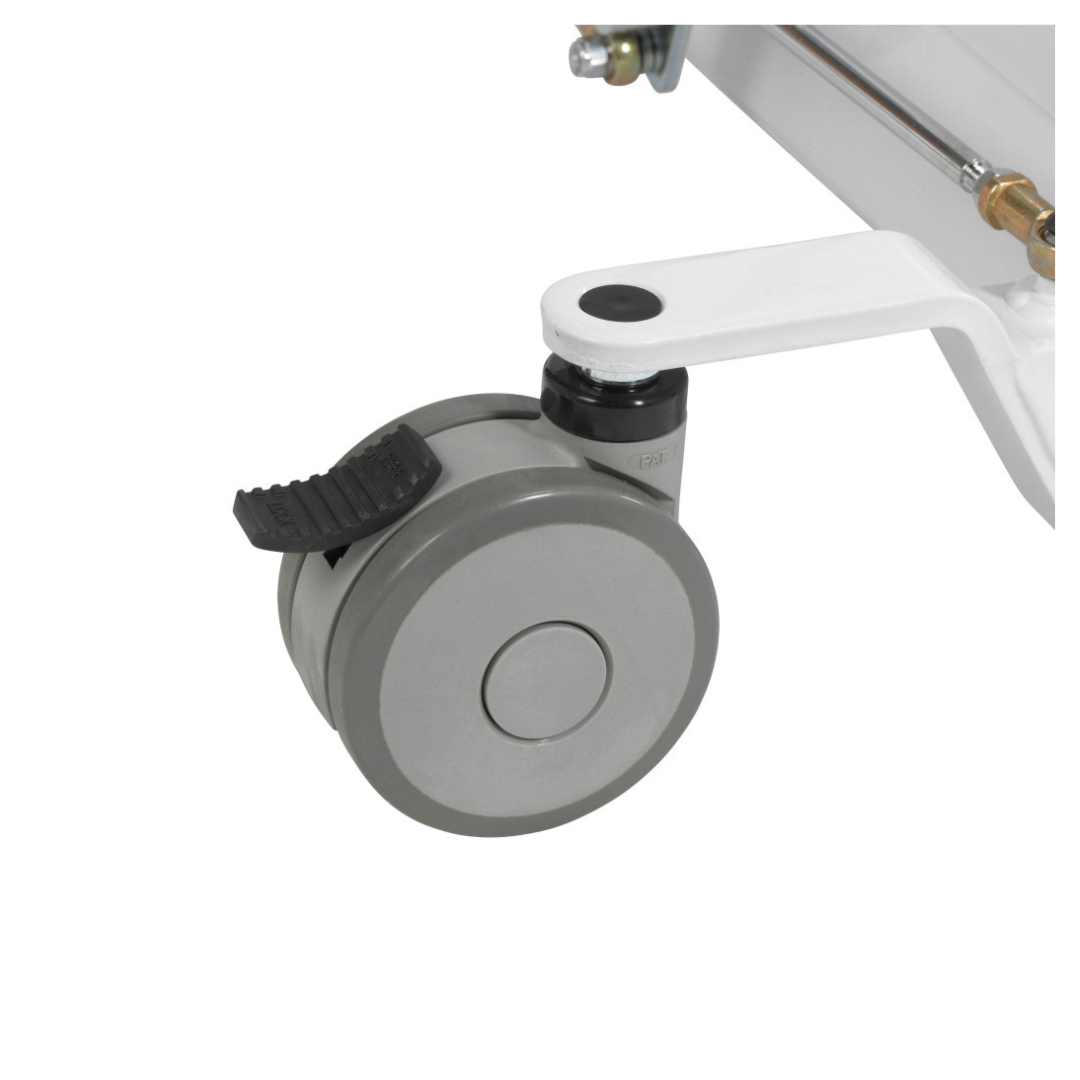 Close-up of a gray swivel caster wheel with a black foot pedal brake, attached to the white metal frame of the Drive Bariatric Battery-Powered Patient Lift.