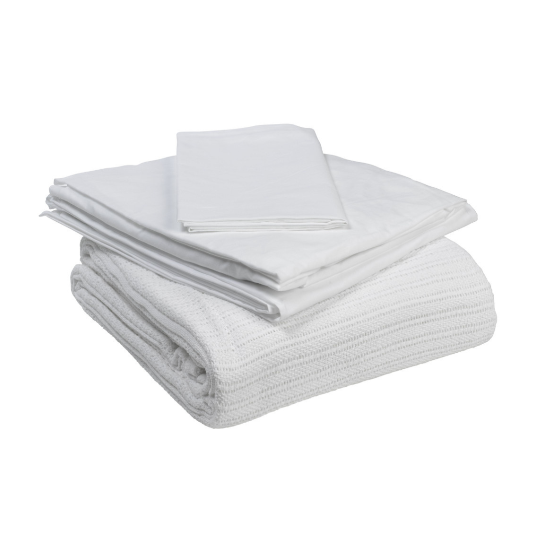 The Drive Bedding in a Box All-In-One Bedding Set, featuring a textured blanket, flat sheet, and pillowcase, is neatly folded and displayed on a plain white background.