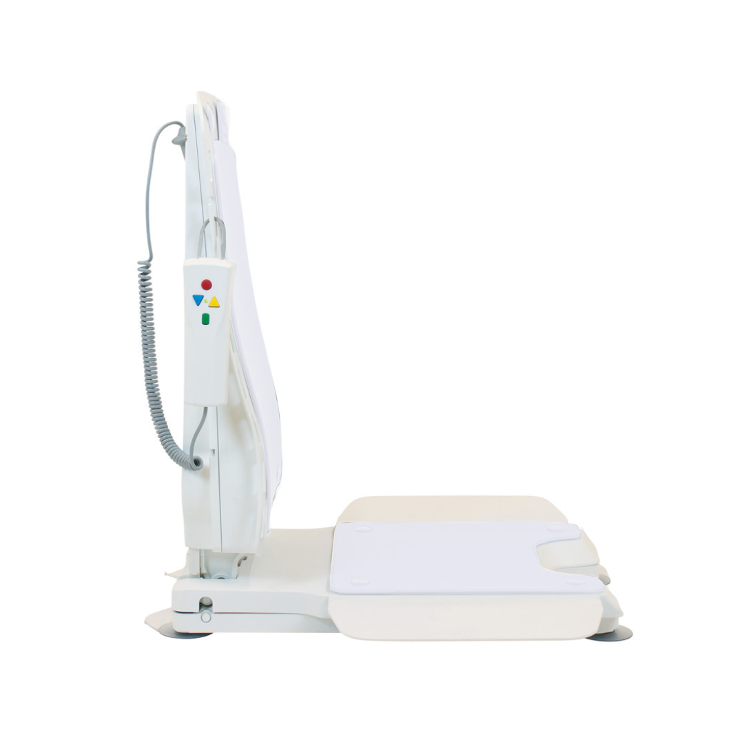 The Drive Bellavita Dive Bath Lift is a white, foldable electric reclining bathtub lift with a flat base, dual-column stability, an upright backrest, and a side-wired remote, shown in side view against a plain white background.