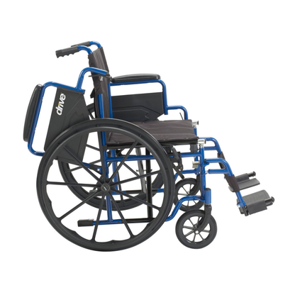 The Drive Blue Streak Portable Wheelchair features a blue and black design, large rear wheels, footrests, and armrests. Seen from the side, it displays the Drive logo—offering reliable comfort and mobility support for users.