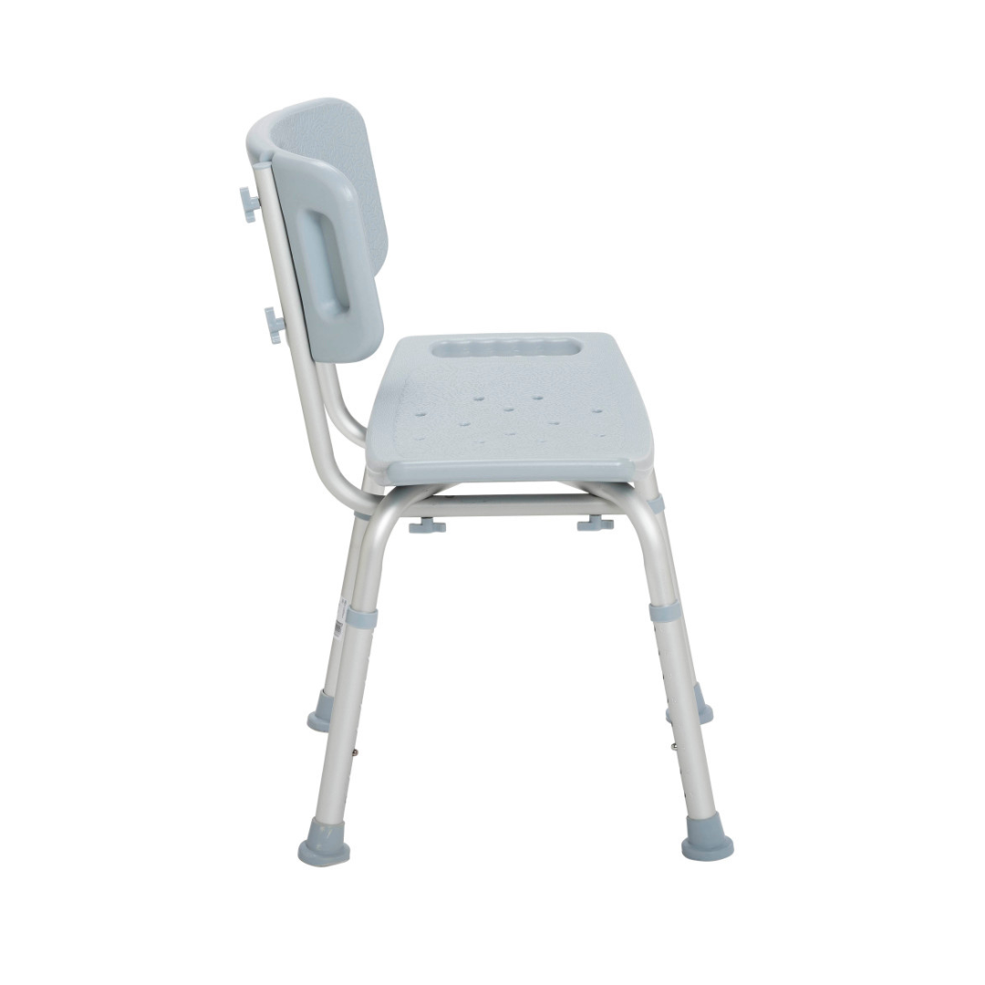 Side view of the Drive Deluxe Aluminum Bath Chair featuring a light gray perforated plastic seat, plastic backrest, height-adjustable aluminum legs, and rubber feet for stability.