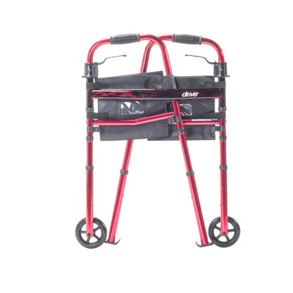 The Drive Deluxe Folding Travel Walker with 5" Wheels, shown in red with black handles, a front storage pouch, and two front wheels against a white background—an ideal compact mobility aid for daily use.