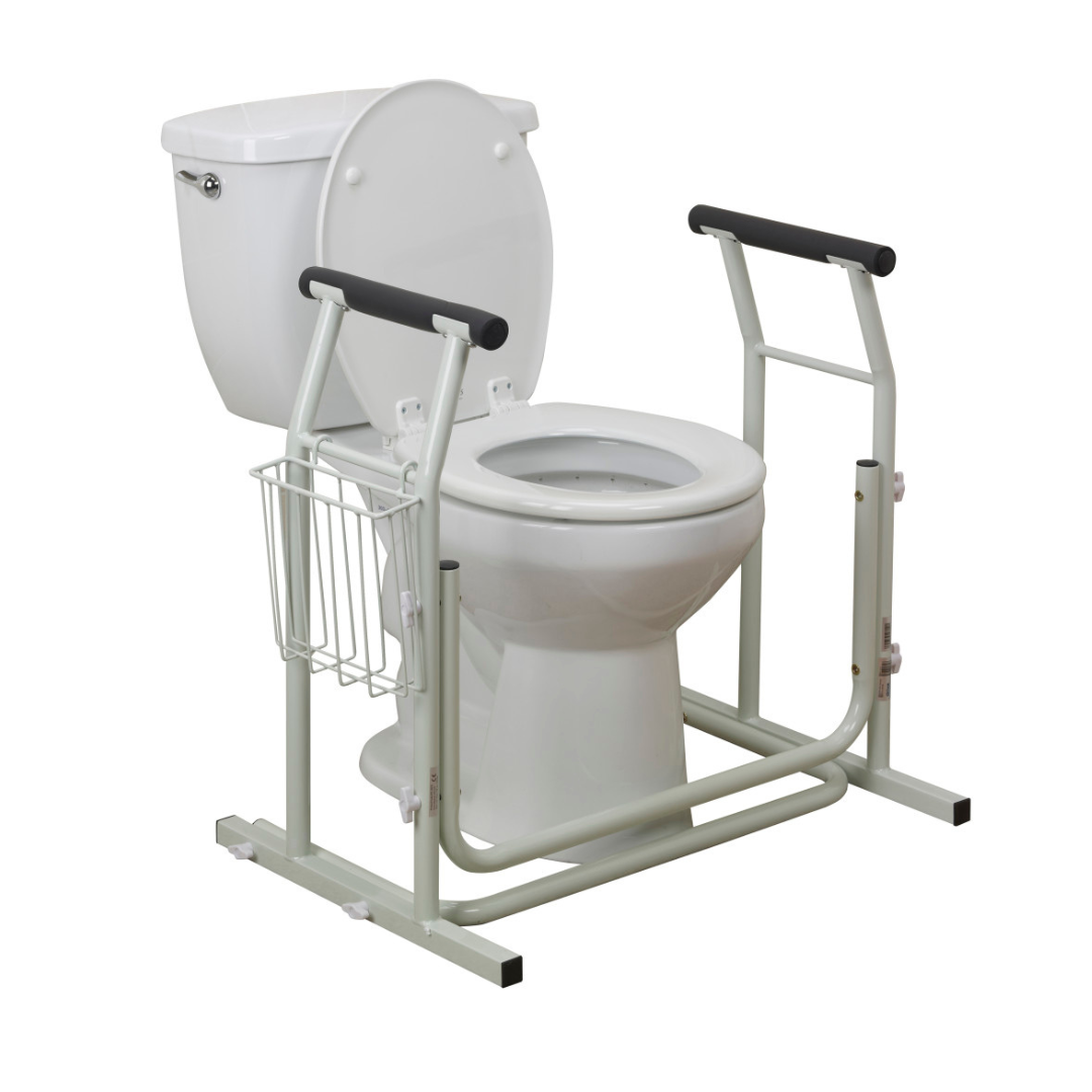 The Drive Free-standing Toilet Safety Rail is a white toilet safety frame with armrests and a side basket, offering extra support and stability for users with mobility challenges.