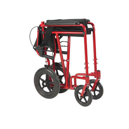 The Drive Lightweight Expedition Aluminum Transport Chair in red is compact for storage or transport, with large rear and small front wheels. Designed for caregiver mobility, the seat and footrests fold neatly, shown against a plain white background.