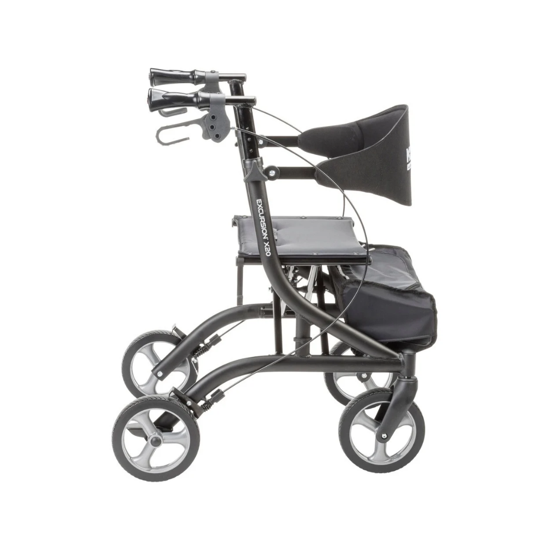 Side profile of a black Drive MD Excursion X20 Portable Rollator featuring a seat, a backrest, and a storage pouch under the seat.