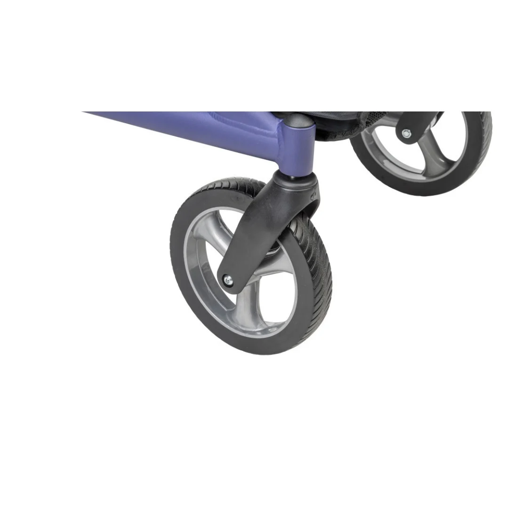Close-up of the front swivel wheels on a purple Drive MD Excursion X20 Portable Rollator.
