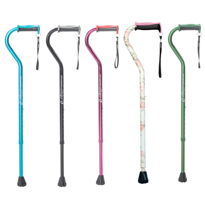 Five Drive Airgo Comfort-Plus Aluminum Canes with offset handles stand upright in blue, black, pink, floral print, and green. Each features a curved handle, wrist strap, and rubber tip for reliable mobility aid.