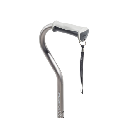 A close-up of a Drive Airgo Comfort-Plus Aluminum Cane with a silver offset handle, curved cushioned comfort-plus grip, and black wrist strap. The ergonomic light gray handle makes it an ideal mobility aid.