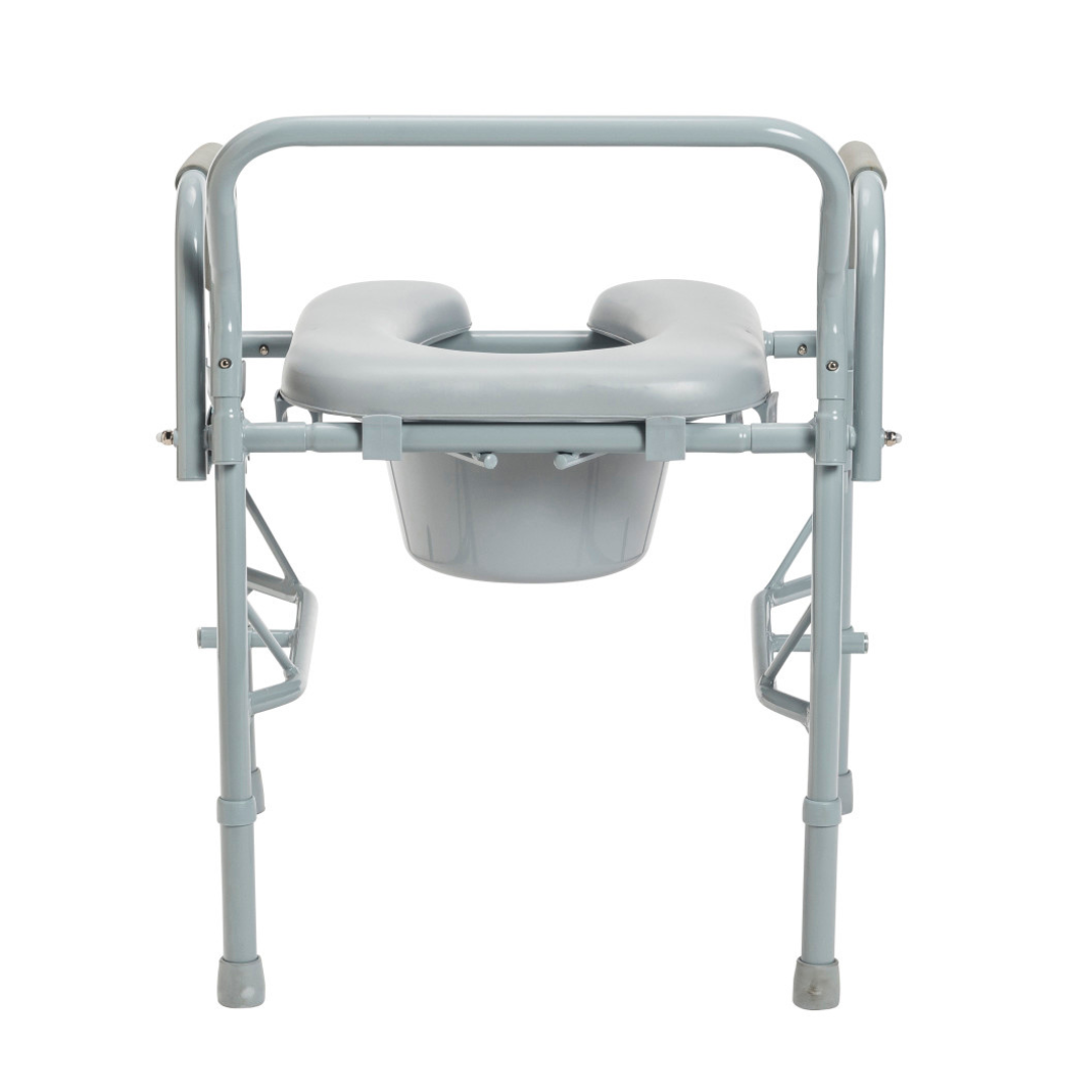The Drive Drop Arm Steel Commode with Padded Seat is a portable gray chair with a raised padded seat, drop armrests, and removable bucket, designed for those with mobility issues needing comfort and easy transfers.