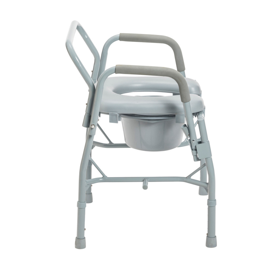 The Drive Drop Arm Steel Commode with Padded Seat is a portable gray bedside chair with armrests and a removable bucket that also works as a raised toilet seat, offering comfort and support for those with mobility challenges.
