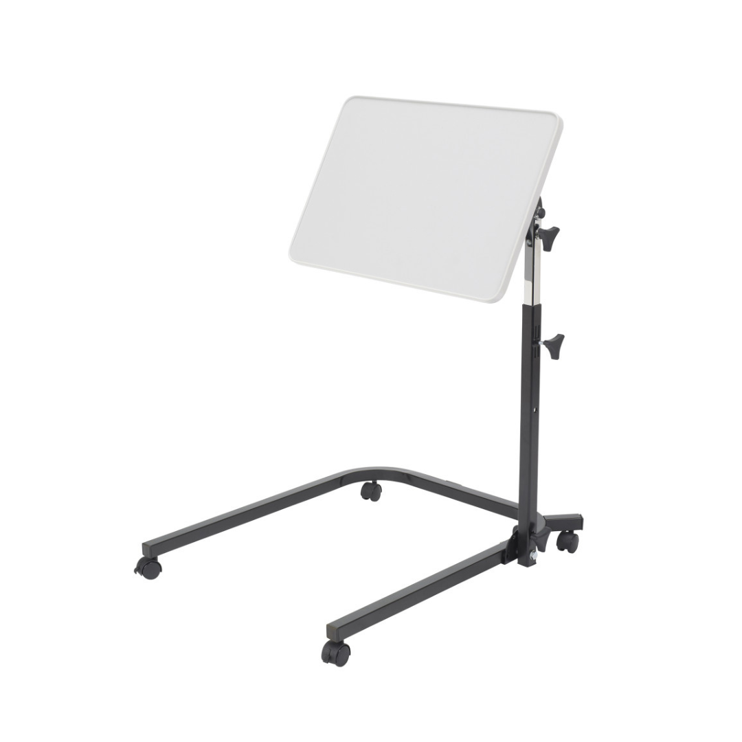 The Drive Pivot & Tilt Overbed Table features a white rectangular surface, black metal frame, and four caster wheels. Its angle and height can be easily adjusted with knobs for customized overbed use.