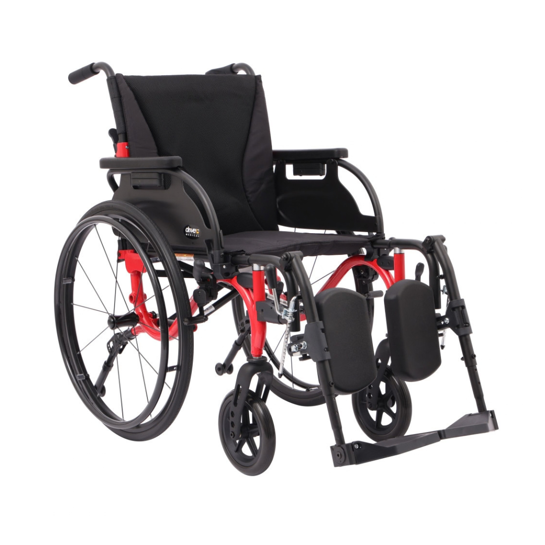 A black and red Drive Nitro Cruise Wheelchairs | Ultralight & Portable faces slightly left, featuring footrests, padded seat, armrests, large rear wheels, and a lightweight aluminum frame at just 28 lbs.
