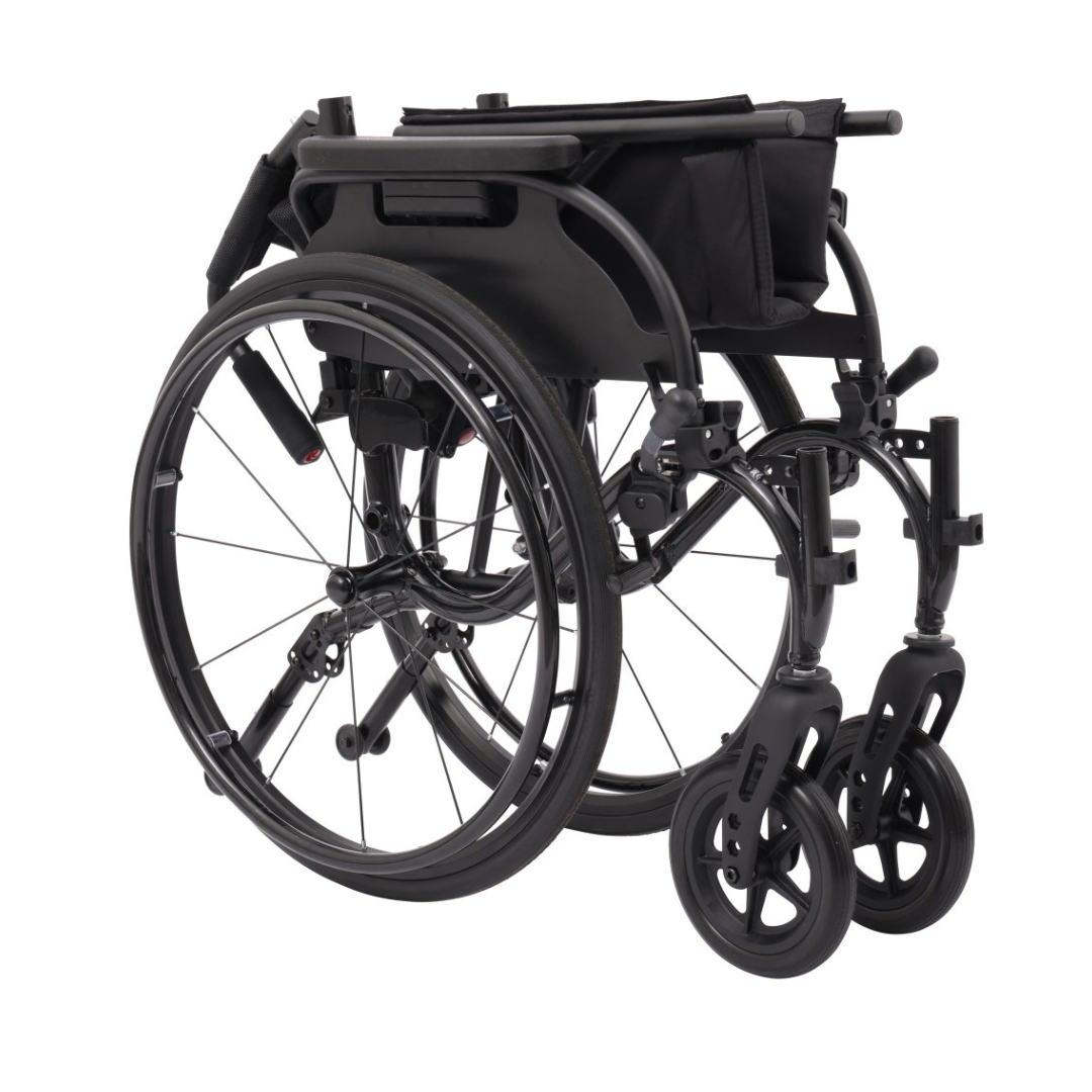 A Drive Nitro Cruise Wheelchairs | Ultralight & Portable folded for storage, with seat and footrests compacted. The visible wheels and frame highlight its streamlined 28 lbs wheelchair design.