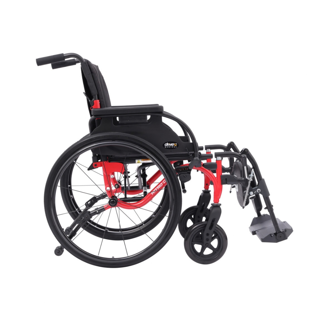 The Drive Nitro Cruise Wheelchairs | Ultralight & Portable features a lightweight aluminum frame in red, black seat and backrest, large rear wheels, small front casters, extended footrests, and weighs only 28 lbs.