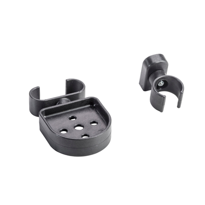 The Cane Holder For Drive Nitro Sprint Rollators includes two black plastic brackets—one large and flat, one small and rounded—with circular clips and multiple holes, designed to securely hold canes or cylindrical items on your rollator.