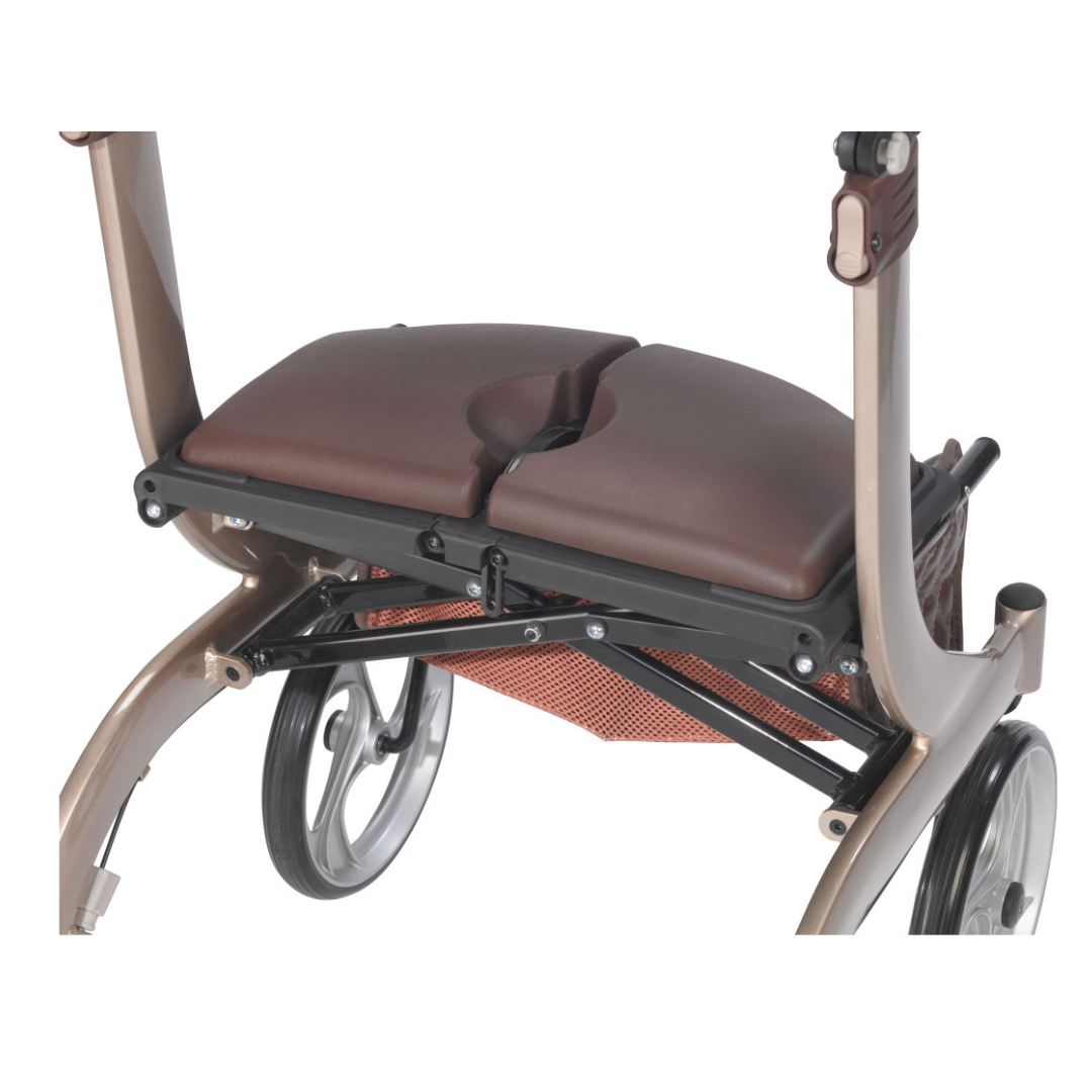 The Drive Nitro® DLX Rollator showcases a close-up of its foldable design, padded brown seat with center cutout, sturdy metal frame, two large wheels, and mesh basket—making it an ideal mobility solution.
