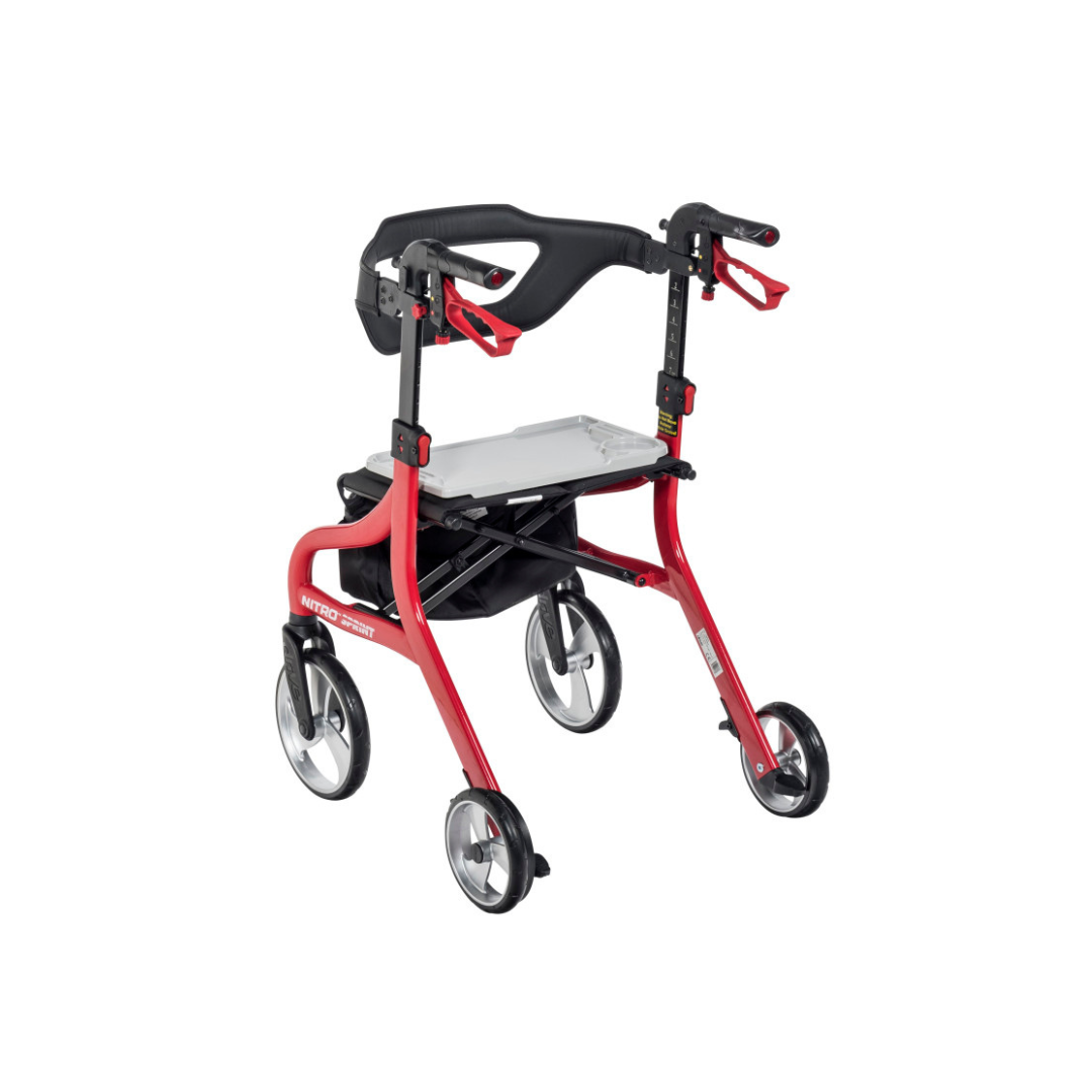 The Tray for Drive Nitro® Sprint Rollators is a seat-mounted tray designed for red and black four-wheeled rollator walkers with built-in seats, hand brakes, and storage compartments, offering added convenience for mobility assistance.