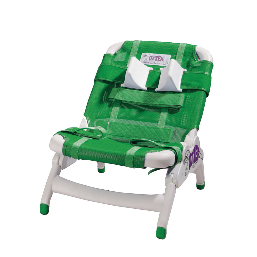 The Drive Otter Bathing System - Waterproof Reclining Chair is a green and white adjustable seat with mesh, harness straps, side panels, and a low sturdy frame designed for safe bathing of children with special needs.