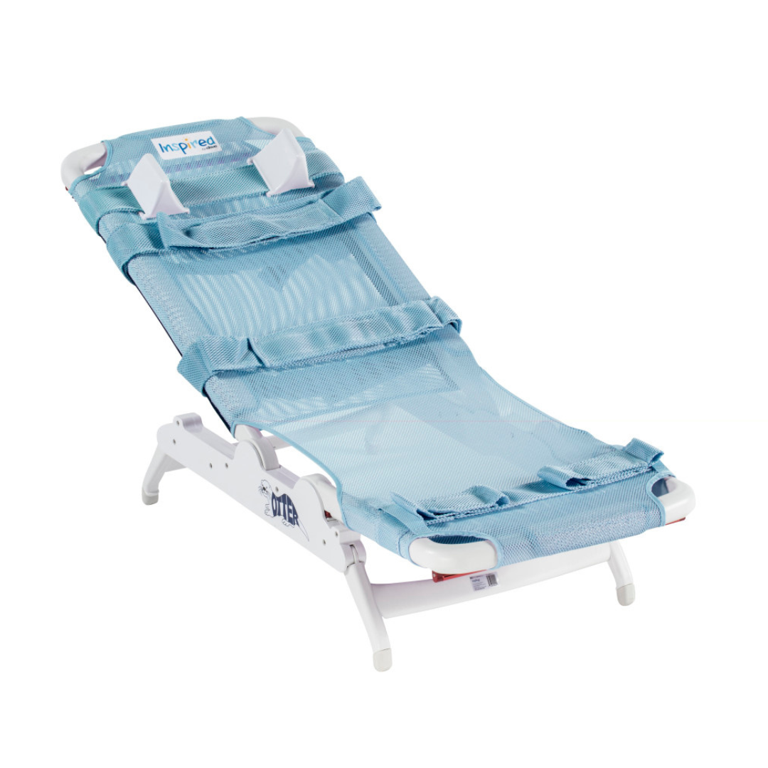 The Drive Otter Bathing System - Waterproof Reclining Chair is a light blue, adjustable chair with mesh fabric and a white metal frame, designed for medical use with multiple safety straps for secure, therapeutic bathing.