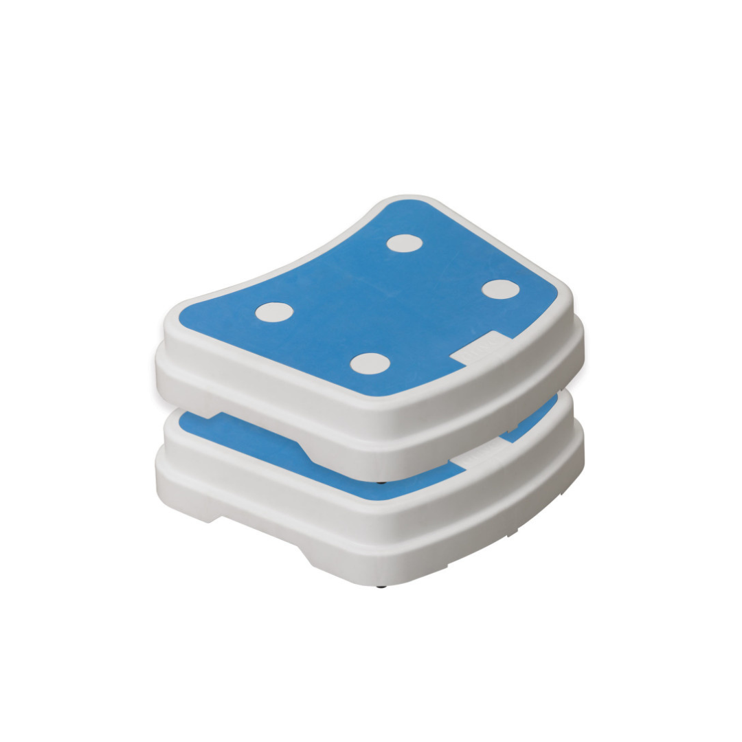 The Drive Portable Bath Step is a white and blue, stackable plastic step with a curved design and four circular anti-slip pads on top to enhance bathtub safety.