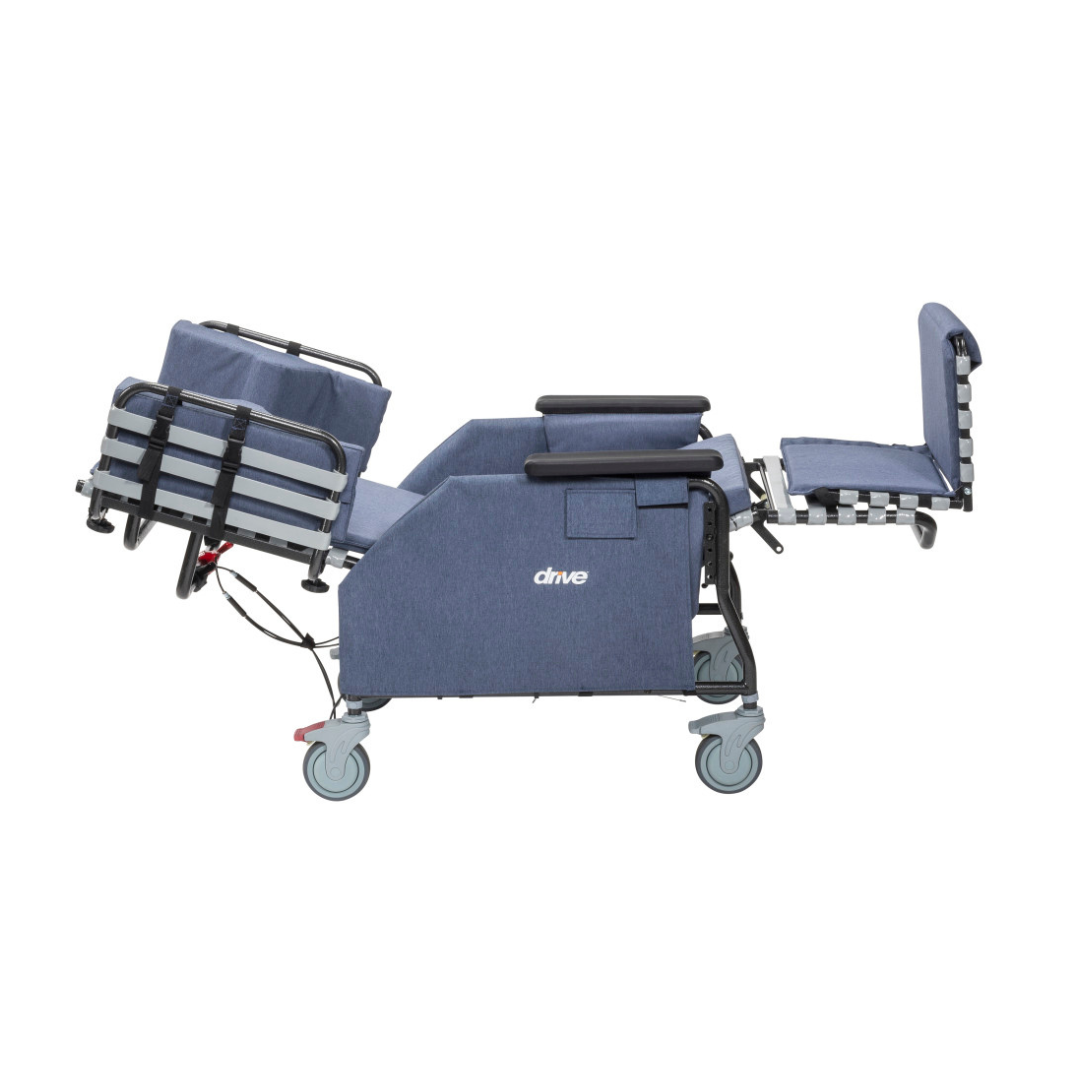 The Drive Rose Comfort Max Tilt and Recline Chair with Casters is a blue padded chair with adjustable leg and back sections, black armrests, four wheels, and a 400 lb weight capacity—ideal for long-term care facilities.