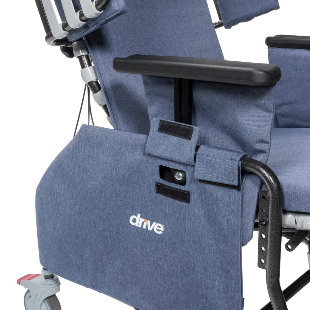 Close-up of the Drive Rose Comfort Max Tilt and Recline Chair with Casters, showing its blue padded armrest and side panel. Built for long-term care, this chair boasts a sturdy metal frame, black armrest, red-accented wheel, and 400 lb weight capacity.