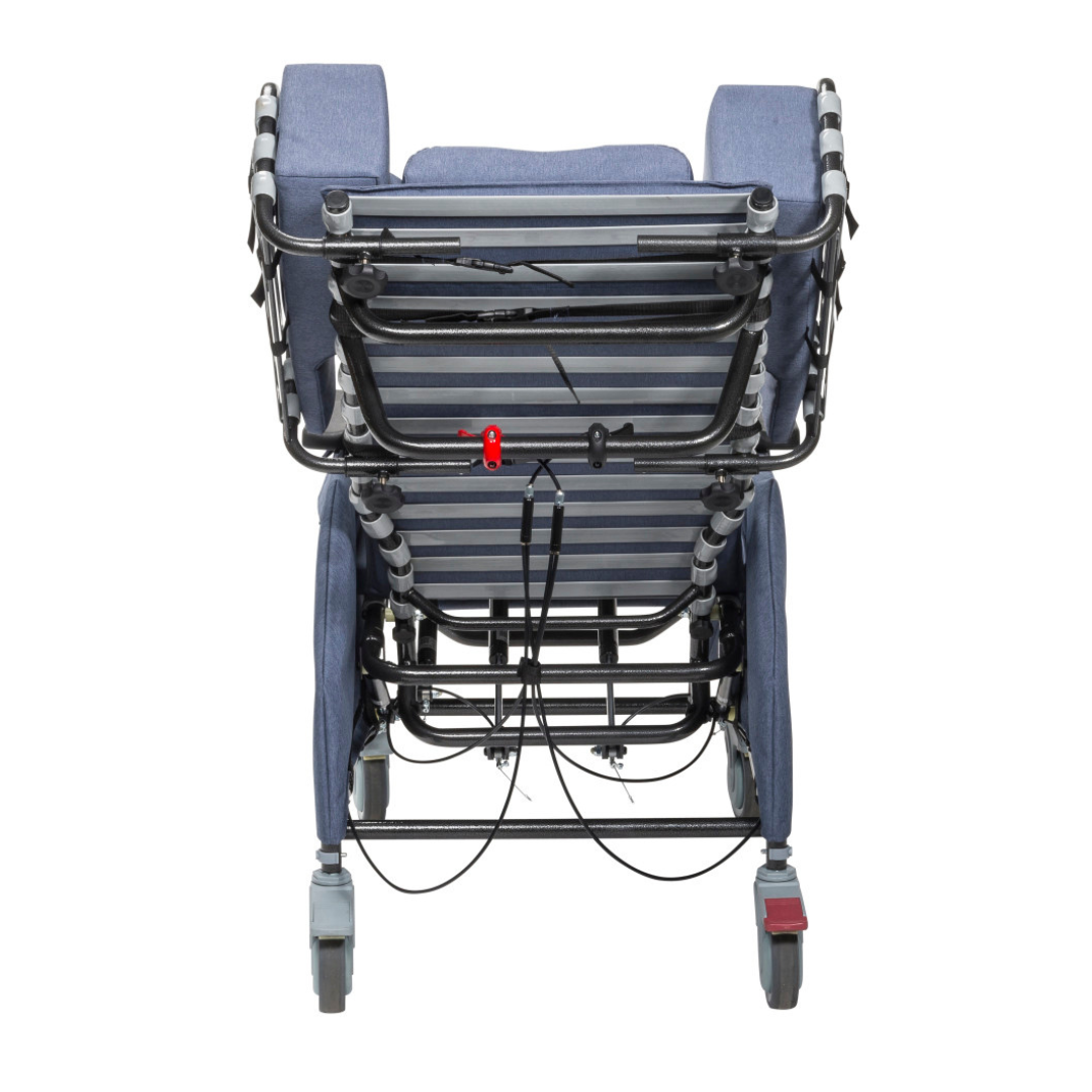 Rear view of the Drive Rose Comfort Max Tilt and Recline Chair with Casters, blue upholstery, metal frame, visible adjustment mechanisms, cables, and caster wheels—one with a red brake lever—designed for long-term care comfort.