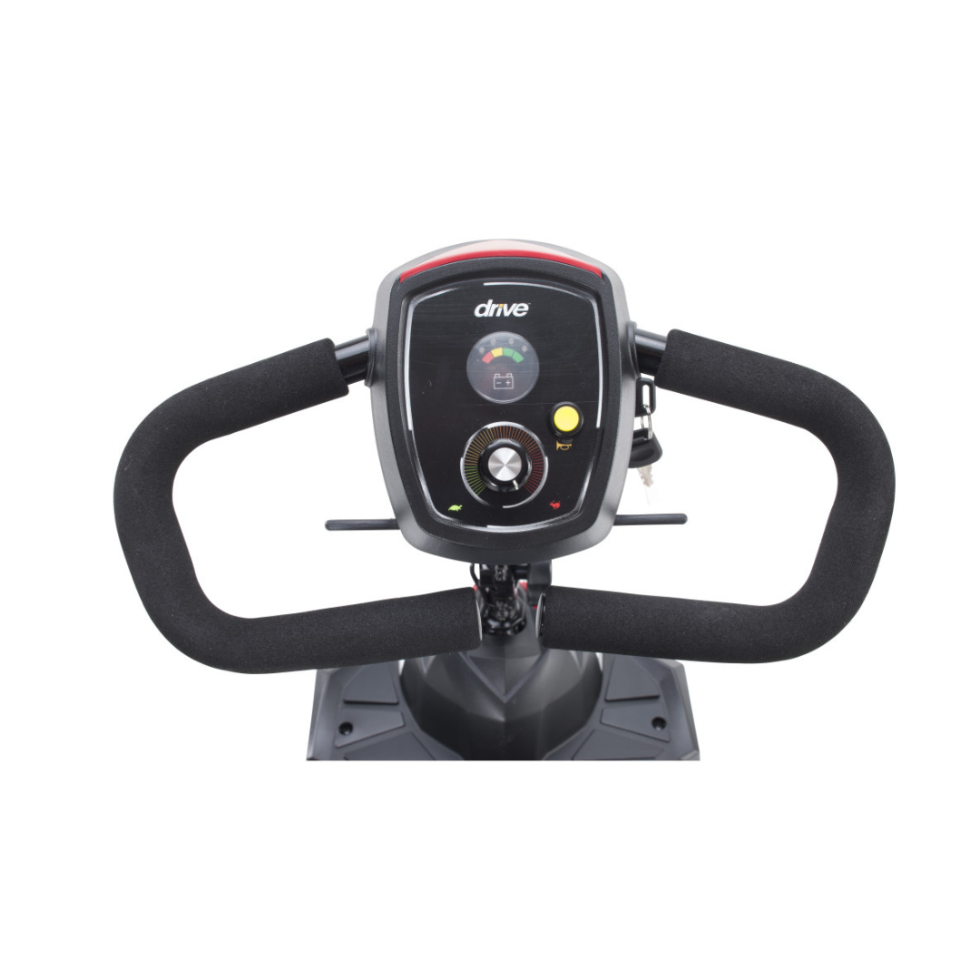 Close-up of the control panel and handlebars on the Drive Scout Compact 3-Wheel Scooter, showing buttons, a speed dial, and a key slot on a black console labeled "drive.