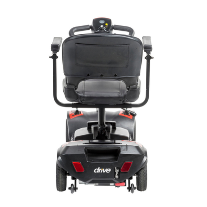 Rear view of a black Drive Scout LT 4-Wheel Scooter featuring armrests, a padded seat, and a control panel on the backrest. The scooter has two rear wheels and "Drive" branding visible on the lower back for easy identification.