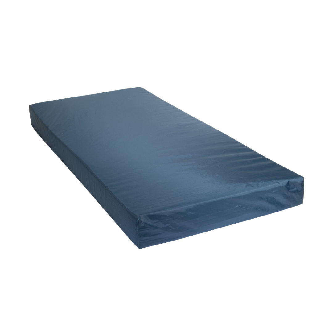 A rectangular blue mattress with a smooth fitted cover is shown on a Drive Delta® Ultra-Light 1000 Bariatric Full-Electric Low Bed against a plain white background.