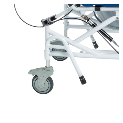 Close-up of the Drive Tilting Aluminum Rehab Rolling Shower Chair with Commode shows its white metal frame, gray and green caster wheel, structural bars, and hydraulic parts.