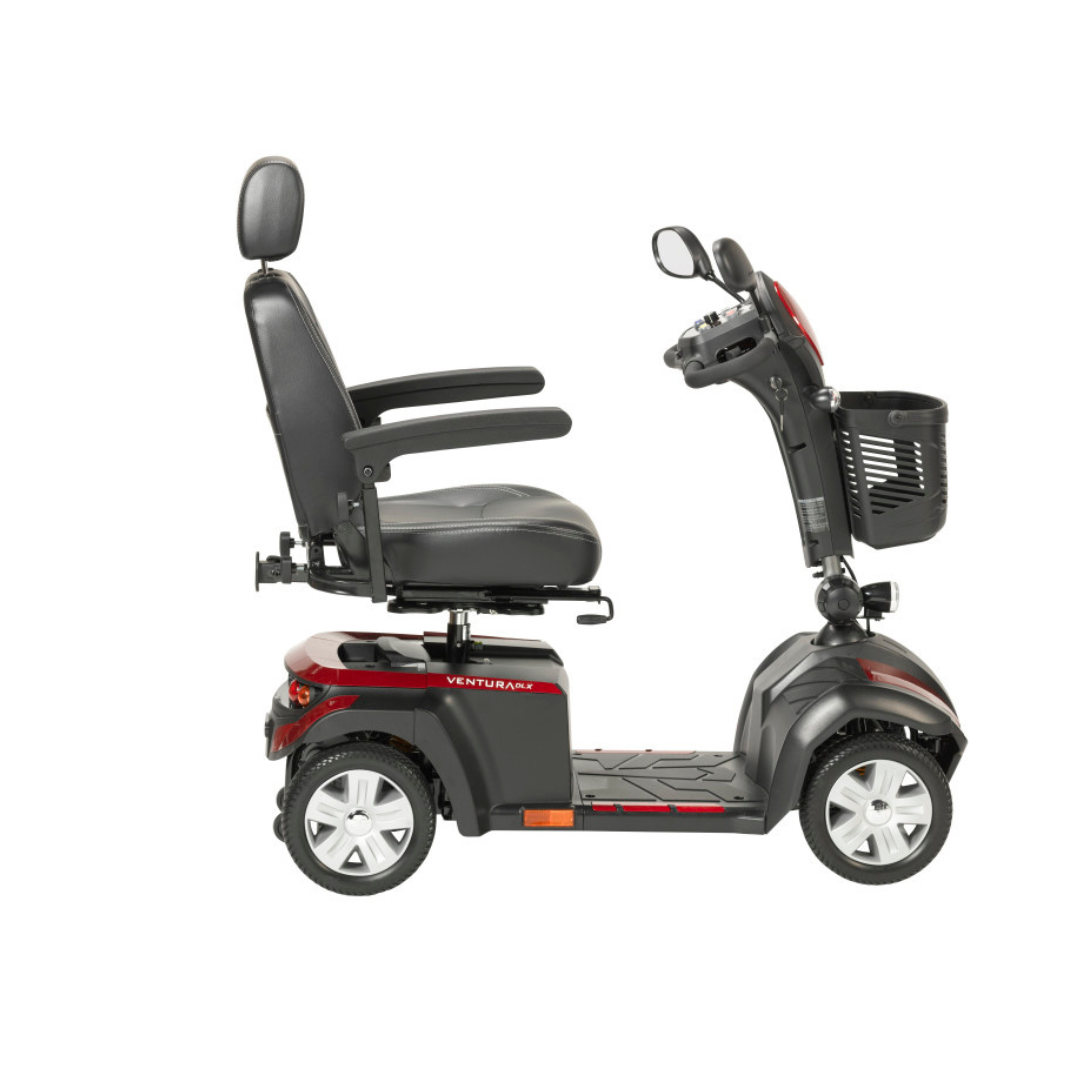A black and red Drive Ventura 4-Wheel HD Bariatric Scooter with a high backrest, armrests, front basket, and four wheels is shown in side profile against a white background.