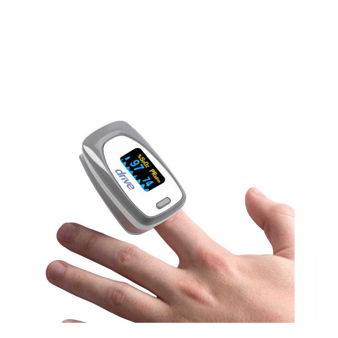 A hand with a Drive View SpO2 Deluxe Pulse Oximeter clipped to the finger shows oxygen saturation and pulse rate on its screen, efficiently monitoring oxygen levels.