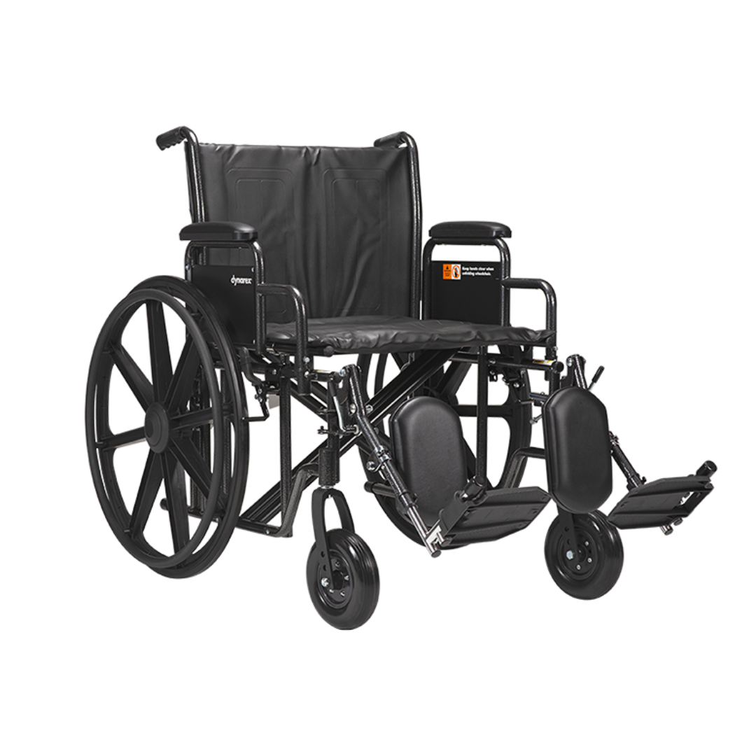 A black Dynarex Bariatric Wheelchair with Elevating Leg Rests featuring large rear wheels, small front wheels, cushioned seat and backrest, padded armrests, and adjustable footrests. The wheelchair is unoccupied.