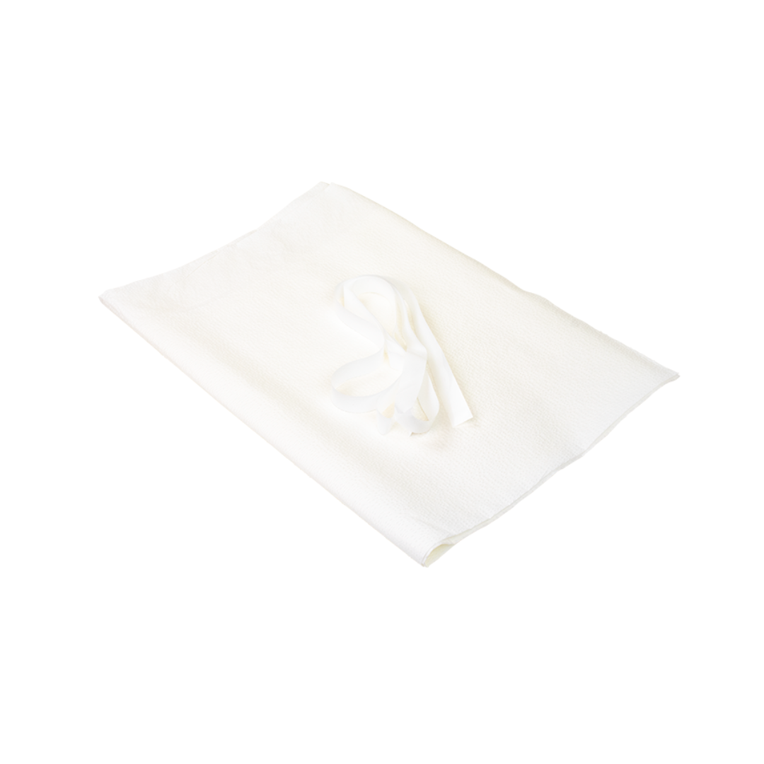A folded Dynarex Exam Gown—disposable patient gown in white—with a matching fabric belt or tie placed on top, isolated on a white background.