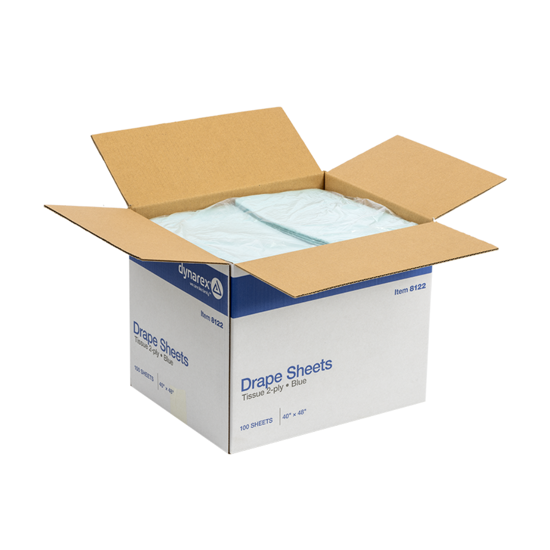 An open box labeled Dynarex Exam Room Drape Sheets reveals light blue 2-ply tissue sheets (40 in x 48 in); box notes 100 medical drape sheets included.