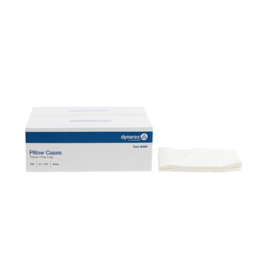 A box of Dynarex Medical Disposable Pillow Cases - 21" x 30", labeled "Pillow Cases, Tissue/Poly 2-ply, 100 count, White," sits next to a stack of white pillow cases.
