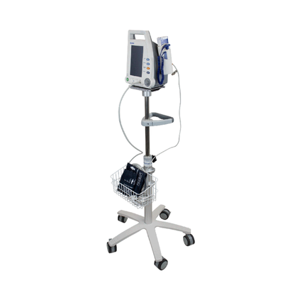 The Dynarex Vital Signs Patient Monitor w/ Stand features a screen, blood pressure cuff, cables, accessory wire basket, and a five-leg wheeled base. Warranty details and specs are available for reference.