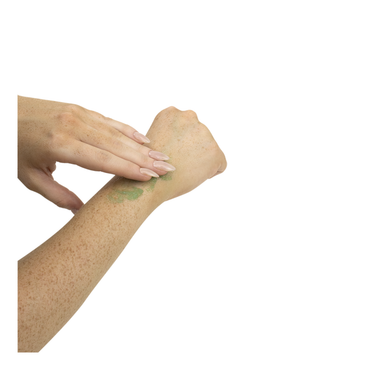 A person uses their fingers to apply Dynarex X-Treme Freeze Pain Relieving Cold Gel to their forearm. The white background emphasizes the hands and treated area.