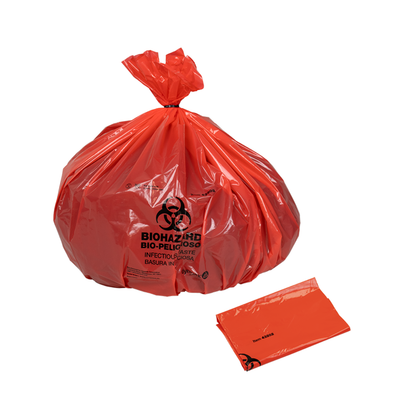 A red Dynarex Biohazard Waste Bag, tied at the top with a black biohazard symbol and warning text, sits beside a folded unused bag, providing secure containment of hazardous materials.