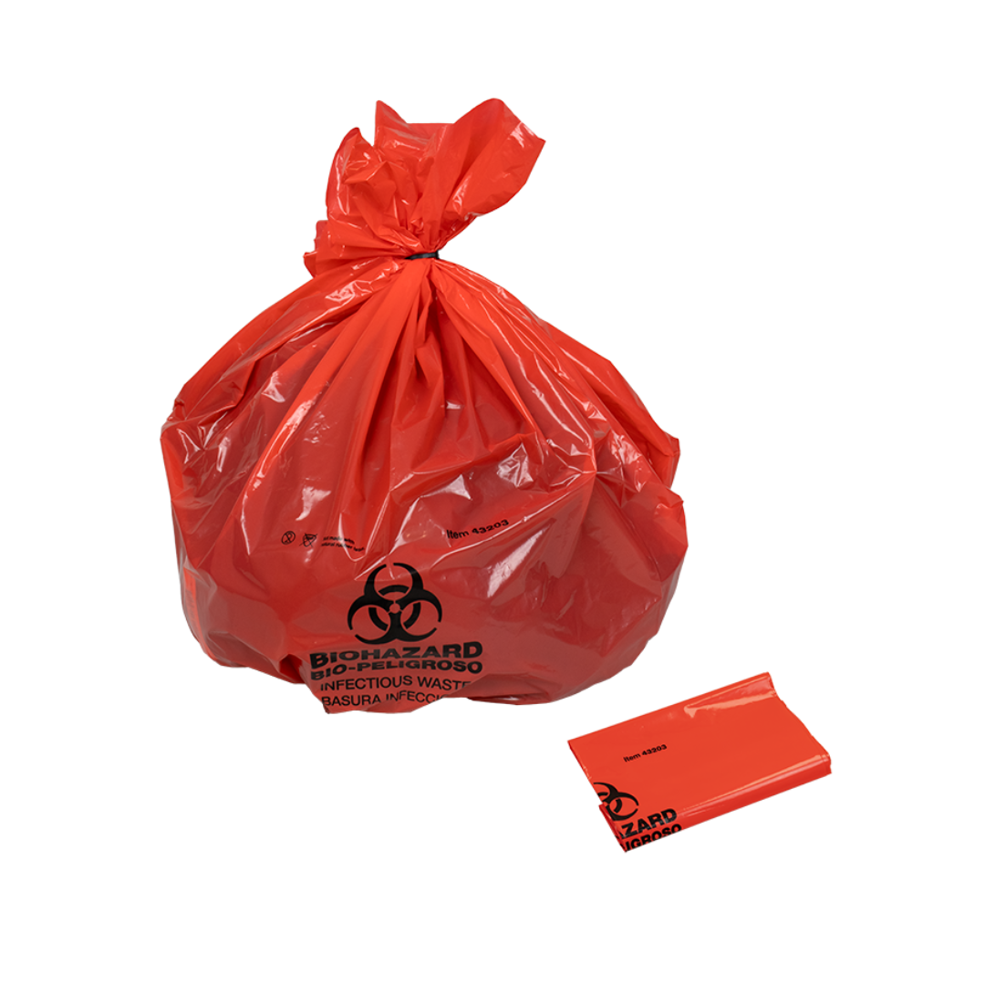 A filled and tied red Dynarex Biohazard Waste Bag with a biohazard symbol and infectious waste label sits beside a folded, unused Dynarex Biohazard Waste Bag.