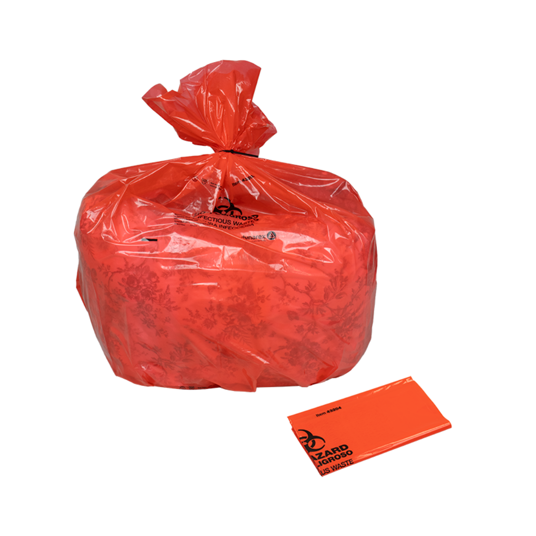 A filled and tied Dynarex Biohazard Waste Bag stands upright for safe containment, with a folded, unused Dynarex Biohazard Waste Bag lying flat beside it on a white background.