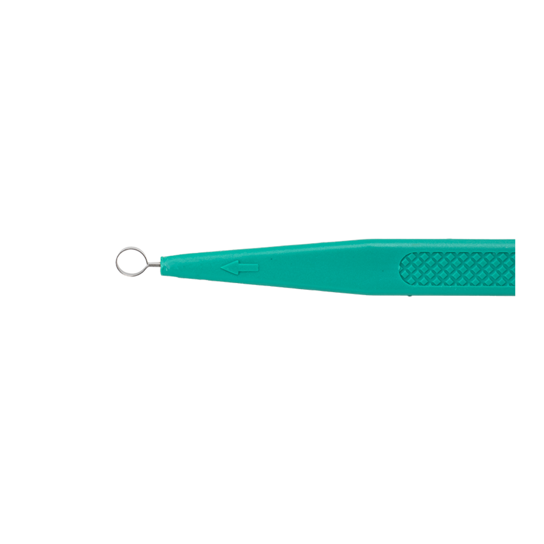 A close-up of a green plastic Dynarex CurPro Dermal Curette with a metal loop tip, designed for blackhead extraction, is shown against a white background.